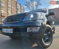 Черный Лексус ГХ, объемом двигателя 4.66 л и пробегом 290 тыс. км за 15950 $, фото 1 на Automoto.ua