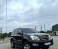 Черный Лексус ГХ, объемом двигателя 4.7 л и пробегом 237 тыс. км за 21500 $, фото 1 на Automoto.ua