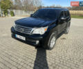 Черный Лексус ГХ, объемом двигателя 4.6 л и пробегом 260 тыс. км за 23500 $, фото 1 на Automoto.ua