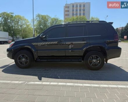 Черный Лексус ГХ, объемом двигателя 4.66 л и пробегом 297 тыс. км за 13500 $, фото 1 на Automoto.ua