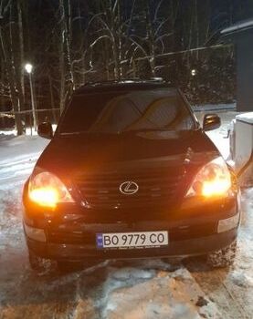Черный Лексус ГХ, объемом двигателя 4.66 л и пробегом 328 тыс. км за 15200 $, фото 1 на Automoto.ua