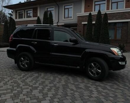 Черный Лексус ГХ, объемом двигателя 4.66 л и пробегом 203 тыс. км за 21500 $, фото 1 на Automoto.ua