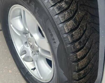 Серый Лексус ГХ, объемом двигателя 4.66 л и пробегом 285 тыс. км за 14600 $, фото 6 на Automoto.ua