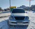 Серый Лексус ГХ, объемом двигателя 4.66 л и пробегом 430 тыс. км за 12700 $, фото 1 на Automoto.ua