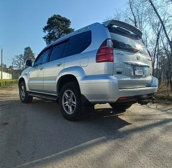 Серый Лексус ГХ, объемом двигателя 4.66 л и пробегом 325 тыс. км за 17800 $, фото 1 на Automoto.ua