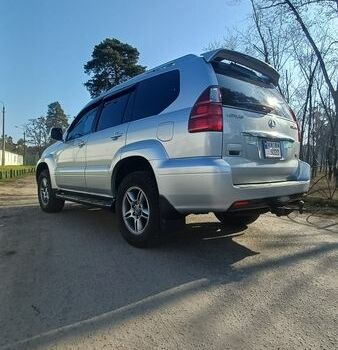 Серый Лексус ГХ, объемом двигателя 4.66 л и пробегом 325 тыс. км за 17800 $, фото 1 на Automoto.ua