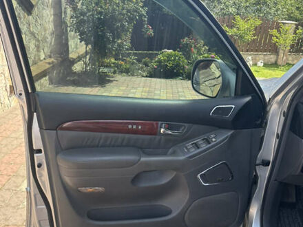 Серый Лексус ГХ, объемом двигателя 4.66 л и пробегом 180 тыс. км за 18900 $, фото 1 на Automoto.ua