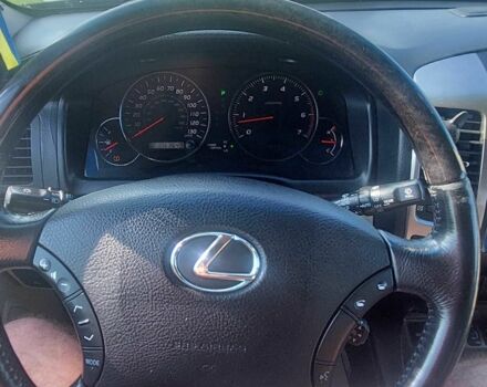 Синий Лексус ГХ, объемом двигателя 4.7 л и пробегом 165 тыс. км за 15500 $, фото 1 на Automoto.ua