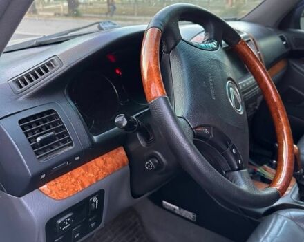 Синій Лексус ГХ, об'ємом двигуна 4.7 л та пробігом 443 тис. км за 13500 $, фото 4 на Automoto.ua