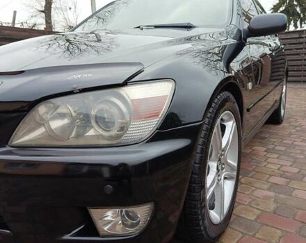 Чорний Лексус ІС, об'ємом двигуна 1.99 л та пробігом 203 тис. км за 4999 $, фото 1 на Automoto.ua