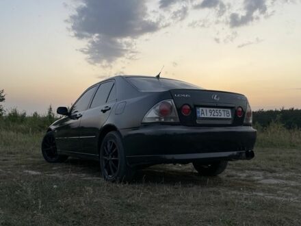 Черный Лексус ИС, объемом двигателя 2 л и пробегом 380 тыс. км за 5600 $, фото 1 на Automoto.ua