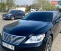 Черный Лексус ЛС, объемом двигателя 4.61 л и пробегом 124 тыс. км за 14800 $, фото 1 на Automoto.ua
