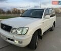 Білий Лексус ЛХ, об'ємом двигуна 4.7 л та пробігом 252 тис. км за 16499 $, фото 1 на Automoto.ua