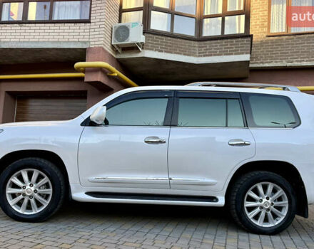 Белый Лексус ЛХ, объемом двигателя 5.66 л и пробегом 299 тыс. км за 22900 $, фото 17 на Automoto.ua