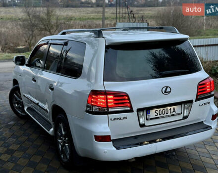 Белый Лексус ЛХ, объемом двигателя 5.7 л и пробегом 307 тыс. км за 20950 $, фото 6 на Automoto.ua