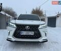 Білий Лексус ЛХ, об'ємом двигуна 5.66 л та пробігом 220 тис. км за 32500 $, фото 1 на Automoto.ua