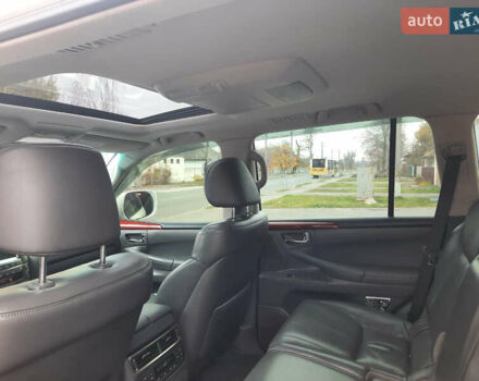 Белый Лексус ЛХ, объемом двигателя 5.66 л и пробегом 348 тыс. км за 16000 $, фото 10 на Automoto.ua