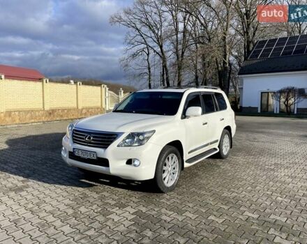 Білий Лексус ЛХ, об'ємом двигуна 5.66 л та пробігом 318 тис. км за 23500 $, фото 1 на Automoto.ua