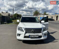 Белый Лексус ЛХ, объемом двигателя 5.66 л и пробегом 348 тыс. км за 21000 $, фото 1 на Automoto.ua