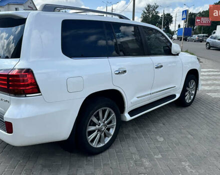 Белый Лексус ЛХ, объемом двигателя 5.66 л и пробегом 173 тыс. км за 30500 $, фото 1 на Automoto.ua