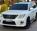 Белый Лексус ЛХ, объемом двигателя 5.66 л и пробегом 320 тыс. км за 29500 $, фото 1 на Automoto.ua