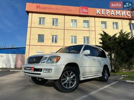 Белый Лексус ЛХ, объемом двигателя 4.7 л и пробегом 256 тыс. км за 15690 $, фото 1 на Automoto.ua
