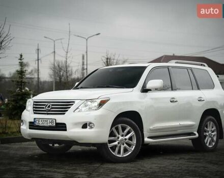 Белый Лексус ЛХ, объемом двигателя 5.66 л и пробегом 200 тыс. км за 24000 $, фото 1 на Automoto.ua
