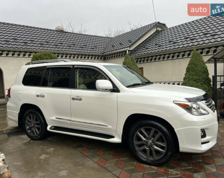 Белый Лексус ЛХ, объемом двигателя 5.66 л и пробегом 157 тыс. км за 29500 $, фото 1 на Automoto.ua