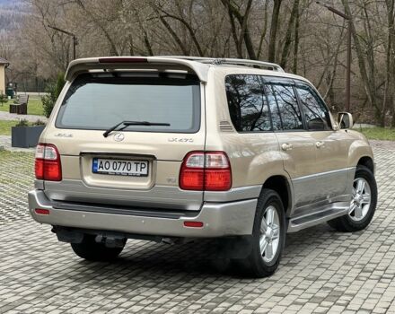 Бежевый Лексус ЛХ, объемом двигателя 4.7 л и пробегом 260 тыс. км за 13500 $, фото 2 на Automoto.ua