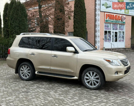 Бежевый Лексус ЛХ, объемом двигателя 5.66 л и пробегом 205 тыс. км за 18999 $, фото 7 на Automoto.ua