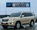 Бежевый Лексус ЛХ, объемом двигателя 5.7 л и пробегом 372 тыс. км за 23500 $, фото 1 на Automoto.ua