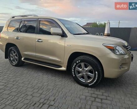 Бежевый Лексус ЛХ, объемом двигателя 5.66 л и пробегом 220 тыс. км за 25500 $, фото 2 на Automoto.ua