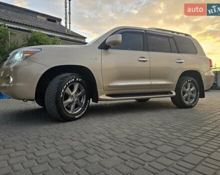 Бежевый Лексус ЛХ, объемом двигателя 5.66 л и пробегом 220 тыс. км за 25500 $, фото 3 на Automoto.ua