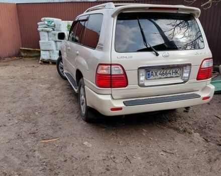 Бежевый Лексус ЛХ, объемом двигателя 4.7 л и пробегом 330 тыс. км за 14000 $, фото 1 на Automoto.ua