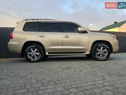 Бежевый Лексус ЛХ, объемом двигателя 5.66 л и пробегом 220 тыс. км за 25500 $, фото 1 на Automoto.ua