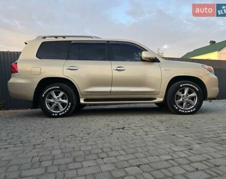 Бежевий Лексус ЛХ, об'ємом двигуна 5.66 л та пробігом 220 тис. км за 21000 $, фото 1 на Automoto.ua
