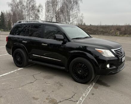 Черный Лексус ЛХ, объемом двигателя 5.7 л и пробегом 330 тыс. км за 21500 $, фото 1 на Automoto.ua