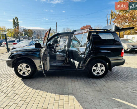 Чорний Лексус ЛХ, об'ємом двигуна 4.66 л та пробігом 348 тис. км за 11200 $, фото 12 на Automoto.ua