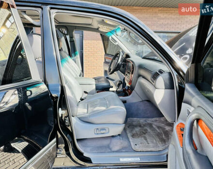 Чорний Лексус ЛХ, об'ємом двигуна 4.66 л та пробігом 348 тис. км за 11200 $, фото 24 на Automoto.ua