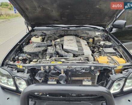 Черный Лексус ЛХ, объемом двигателя 4.7 л и пробегом 415 тыс. км за 16000 $, фото 24 на Automoto.ua