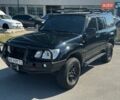 Черный Лексус ЛХ, объемом двигателя 4.66 л и пробегом 320 тыс. км за 15900 $, фото 1 на Automoto.ua