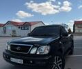 Черный Лексус ЛХ, объемом двигателя 4.7 л и пробегом 255 тыс. км за 18555 $, фото 1 на Automoto.ua
