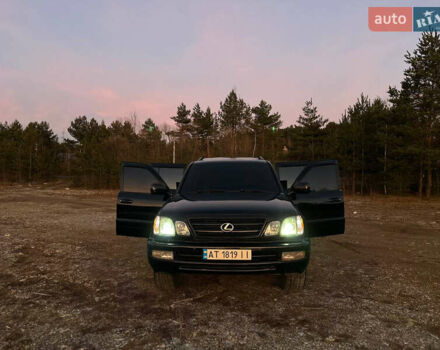 Черный Лексус ЛХ, объемом двигателя 4.66 л и пробегом 330 тыс. км за 12700 $, фото 1 на Automoto.ua