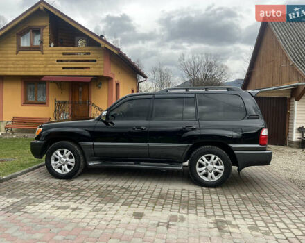 Черный Лексус ЛХ, объемом двигателя 4.66 л и пробегом 260 тыс. км за 13500 $, фото 1 на Automoto.ua