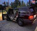 Черный Лексус ЛХ, объемом двигателя 4.66 л и пробегом 370 тыс. км за 14500 $, фото 1 на Automoto.ua