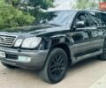 Черный Лексус ЛХ, объемом двигателя 4.67 л и пробегом 291 тыс. км за 11800 $, фото 1 на Automoto.ua