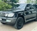 Черный Лексус ЛХ, объемом двигателя 4.7 л и пробегом 291 тыс. км за 11800 $, фото 1 на Automoto.ua