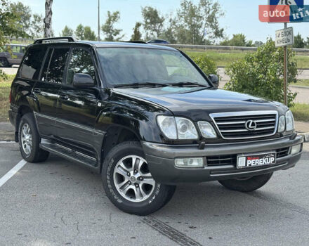 Черный Лексус ЛХ, объемом двигателя 4.7 л и пробегом 299 тыс. км за 12999 $, фото 1 на Automoto.ua