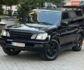Черный Лексус ЛХ, объемом двигателя 4.7 л и пробегом 260 тыс. км за 12700 $, фото 1 на Automoto.ua