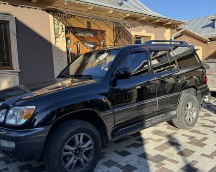 Черный Лексус ЛХ, объемом двигателя 4.66 л и пробегом 292 тыс. км за 12800 $, фото 2 на Automoto.ua